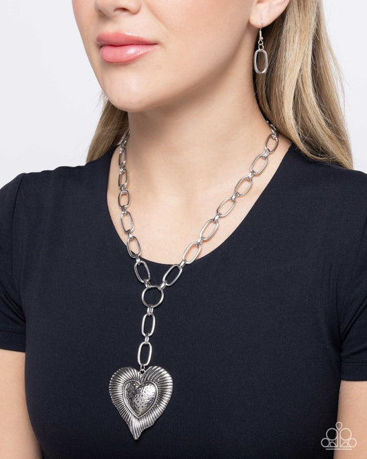 High Fidelity - Silver.    Paparazzi Necklace ~